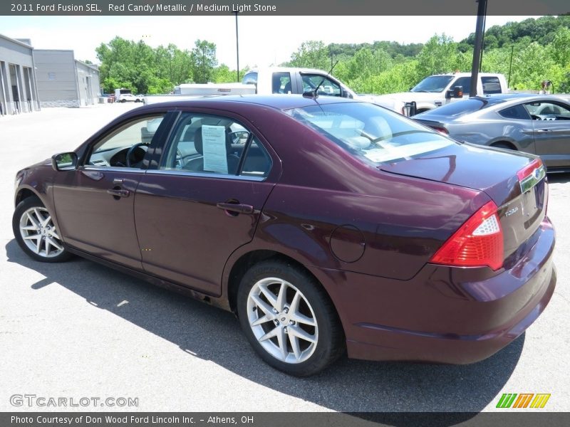 Red Candy Metallic / Medium Light Stone 2011 Ford Fusion SEL