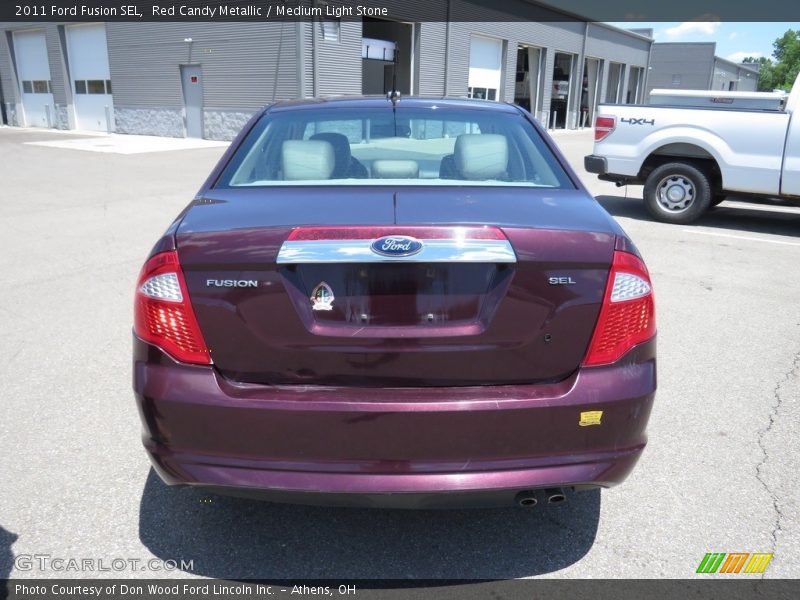Red Candy Metallic / Medium Light Stone 2011 Ford Fusion SEL