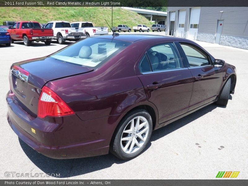 Red Candy Metallic / Medium Light Stone 2011 Ford Fusion SEL