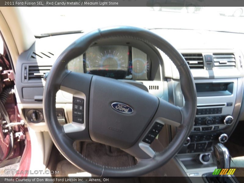 Red Candy Metallic / Medium Light Stone 2011 Ford Fusion SEL