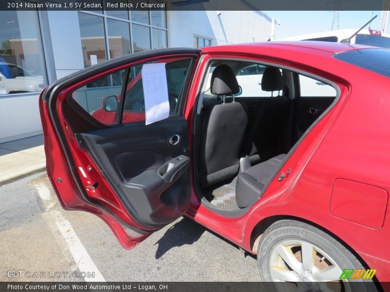 Red Brick / Charcoal 2014 Nissan Versa 1.6 SV Sedan