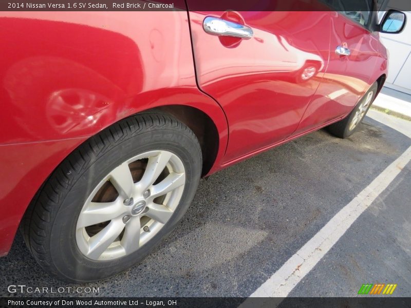 Red Brick / Charcoal 2014 Nissan Versa 1.6 SV Sedan