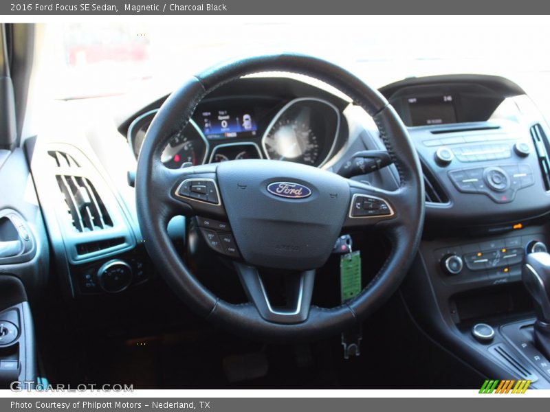 Magnetic / Charcoal Black 2016 Ford Focus SE Sedan
