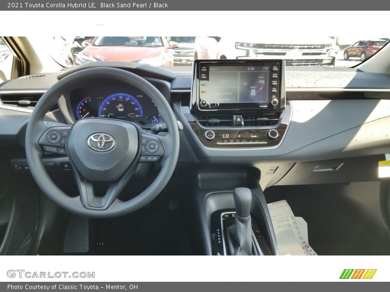 Dashboard of 2021 Corolla Hybrid LE