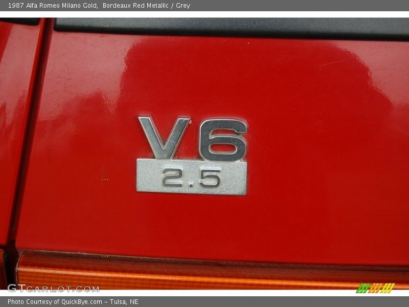  1987 Milano Gold Logo