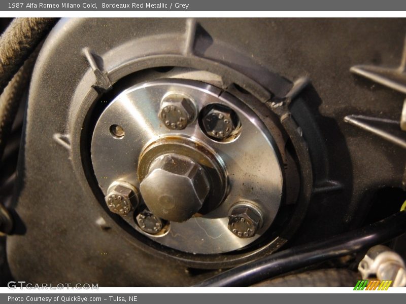 Bordeaux Red Metallic / Grey 1987 Alfa Romeo Milano Gold
