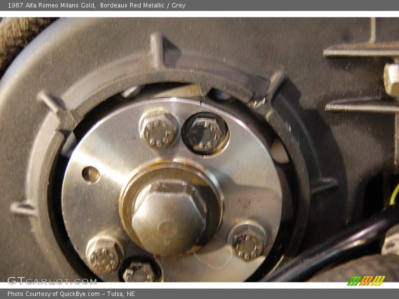 Bordeaux Red Metallic / Grey 1987 Alfa Romeo Milano Gold