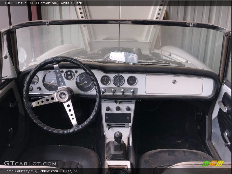 White / Black 1966 Datsun 1600 Convertible