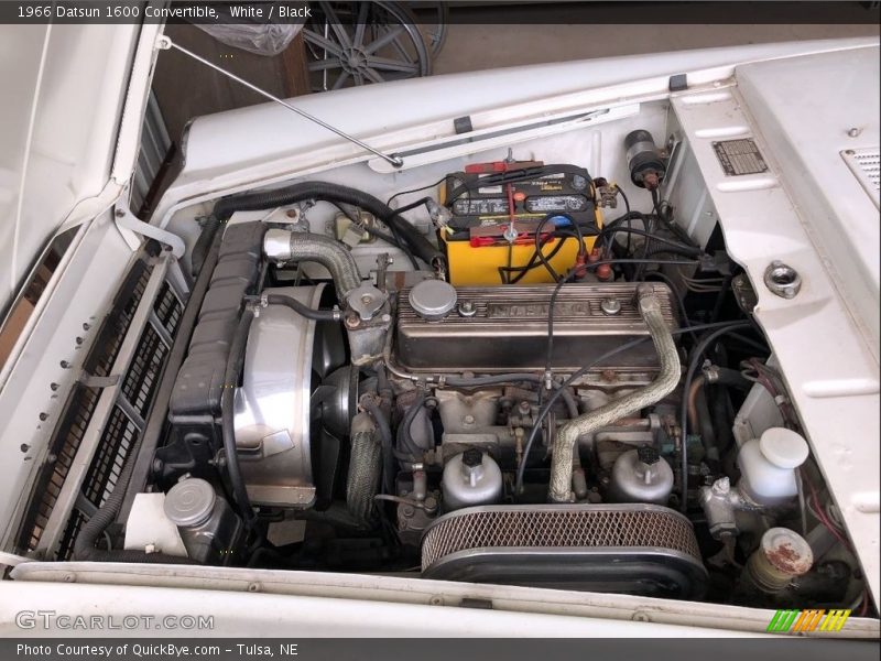White / Black 1966 Datsun 1600 Convertible