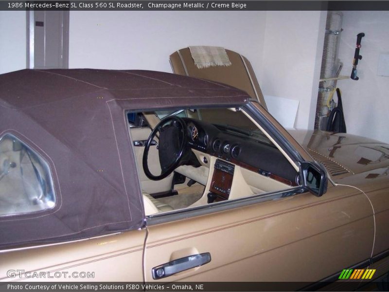 Champagne Metallic / Creme Beige 1986 Mercedes-Benz SL Class 560 SL Roadster