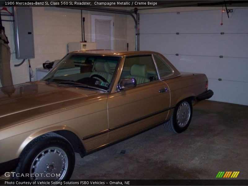 Champagne Metallic / Creme Beige 1986 Mercedes-Benz SL Class 560 SL Roadster