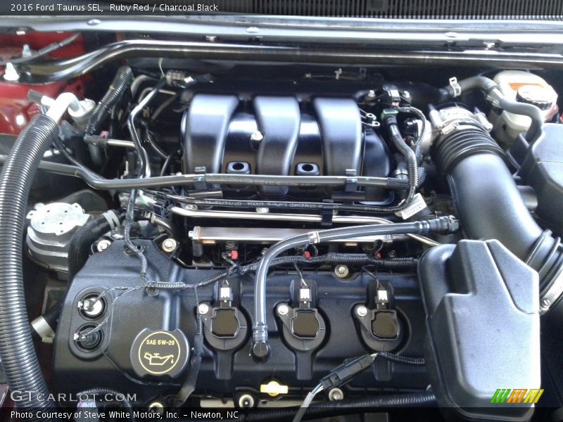 Ruby Red / Charcoal Black 2016 Ford Taurus SEL