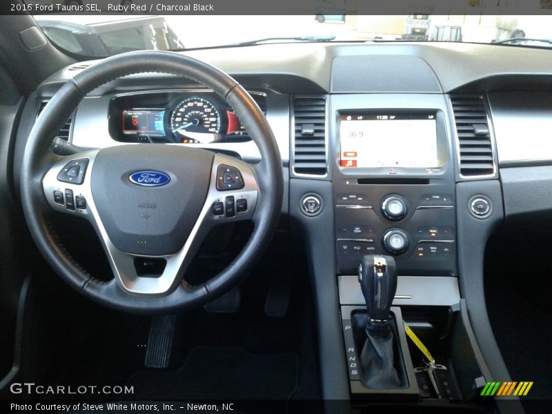 Ruby Red / Charcoal Black 2016 Ford Taurus SEL