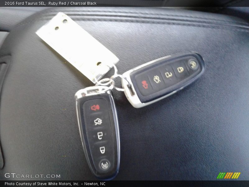 Ruby Red / Charcoal Black 2016 Ford Taurus SEL