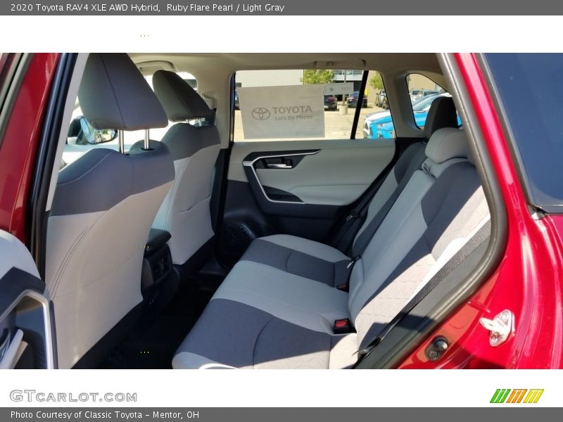 Ruby Flare Pearl / Light Gray 2020 Toyota RAV4 XLE AWD Hybrid