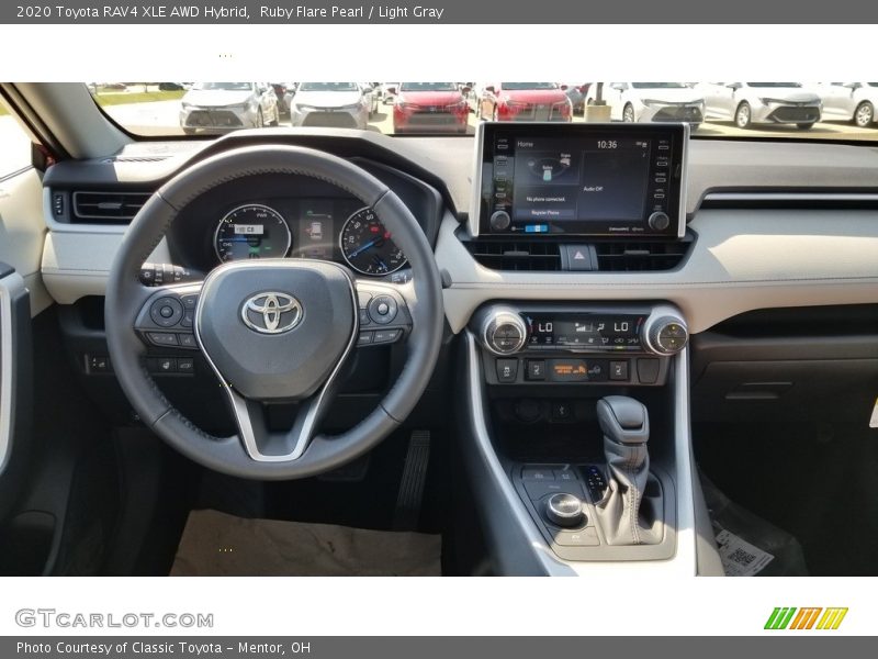 Ruby Flare Pearl / Light Gray 2020 Toyota RAV4 XLE AWD Hybrid