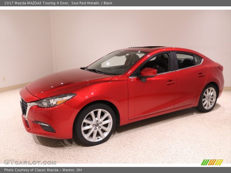 Soul Red Metallic / Black 2017 Mazda MAZDA3 Touring 4 Door