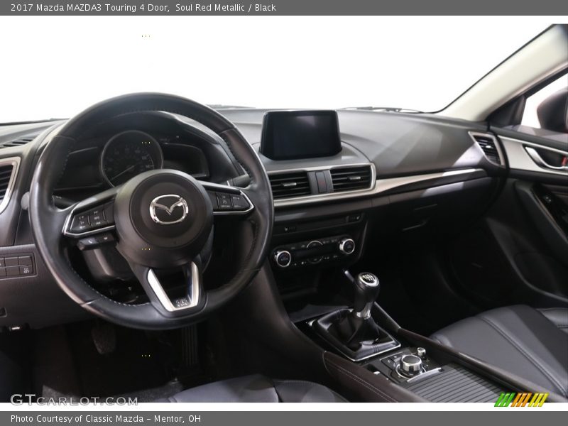 Soul Red Metallic / Black 2017 Mazda MAZDA3 Touring 4 Door