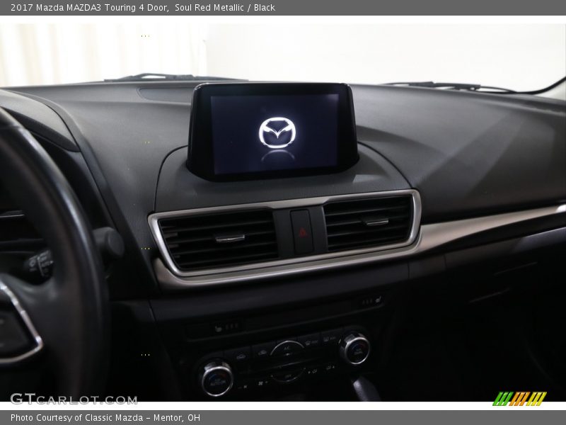 Soul Red Metallic / Black 2017 Mazda MAZDA3 Touring 4 Door