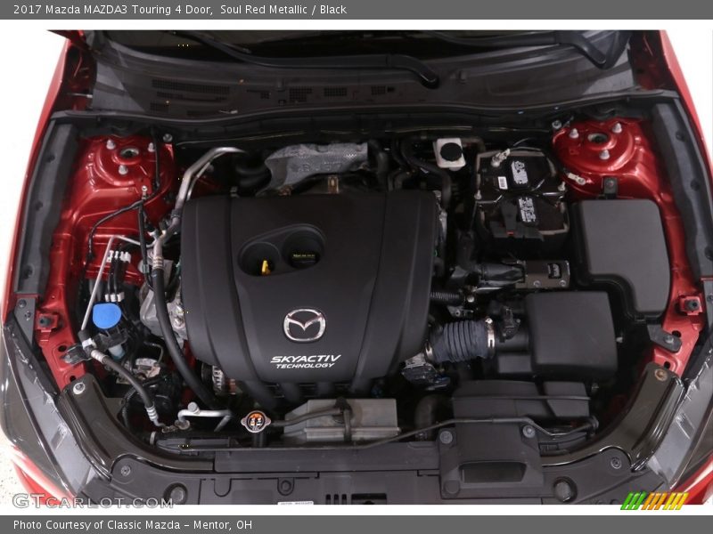 Soul Red Metallic / Black 2017 Mazda MAZDA3 Touring 4 Door