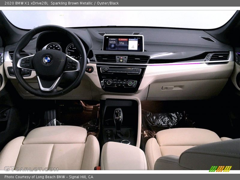 Sparkling Brown Metallic / Oyster/Black 2020 BMW X1 xDrive28i