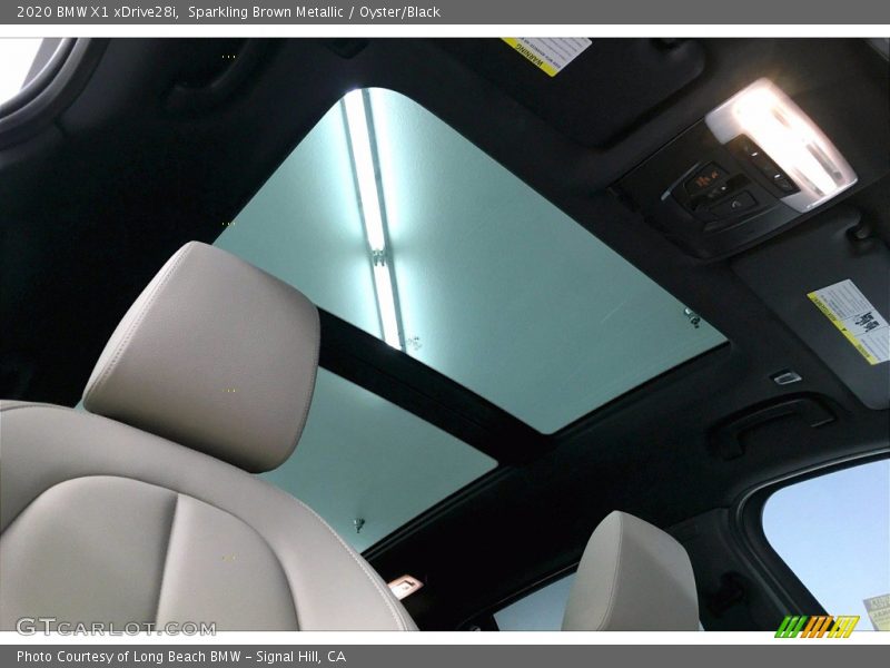 Sparkling Brown Metallic / Oyster/Black 2020 BMW X1 xDrive28i