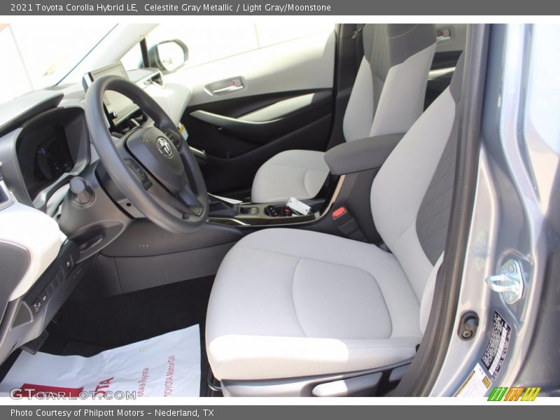 Front Seat of 2021 Corolla Hybrid LE