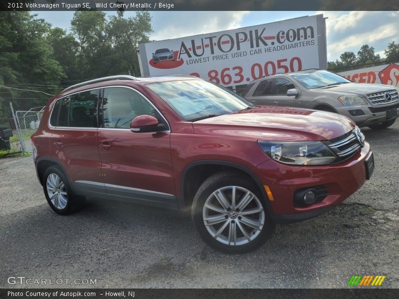 Wild Cherry Metallic / Beige 2012 Volkswagen Tiguan SE