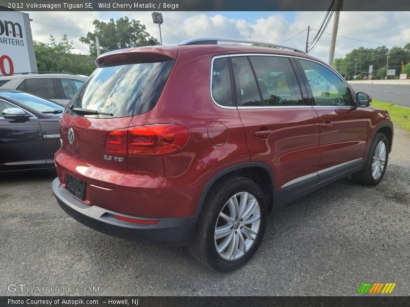 Wild Cherry Metallic / Beige 2012 Volkswagen Tiguan SE