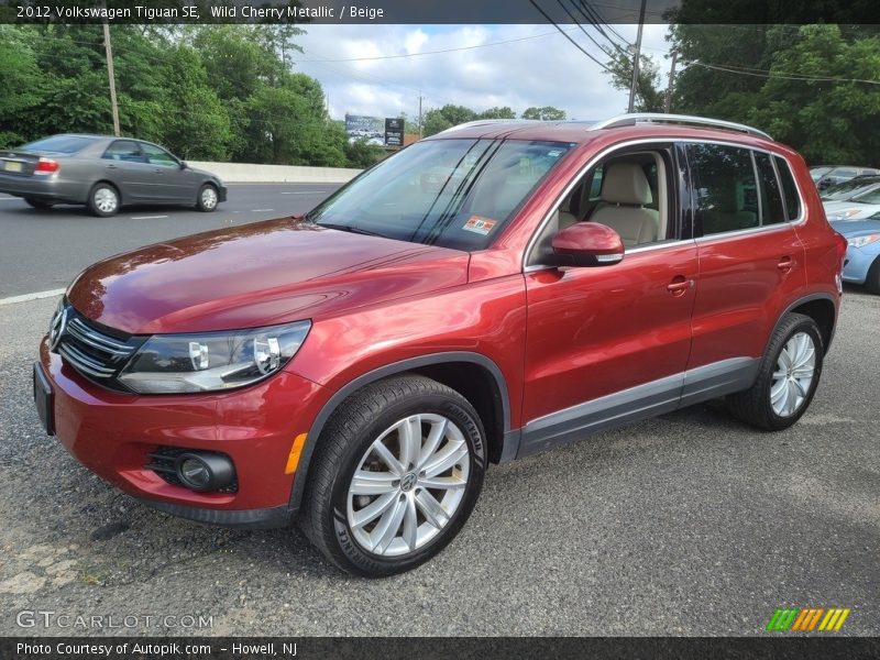 Wild Cherry Metallic / Beige 2012 Volkswagen Tiguan SE