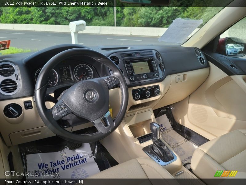 Wild Cherry Metallic / Beige 2012 Volkswagen Tiguan SE
