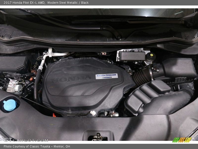 Modern Steel Metallic / Black 2017 Honda Pilot EX-L AWD