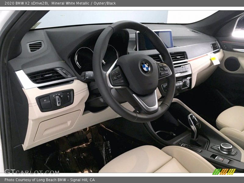 Mineral White Metallic / Oyster/Black 2020 BMW X2 sDrive28i