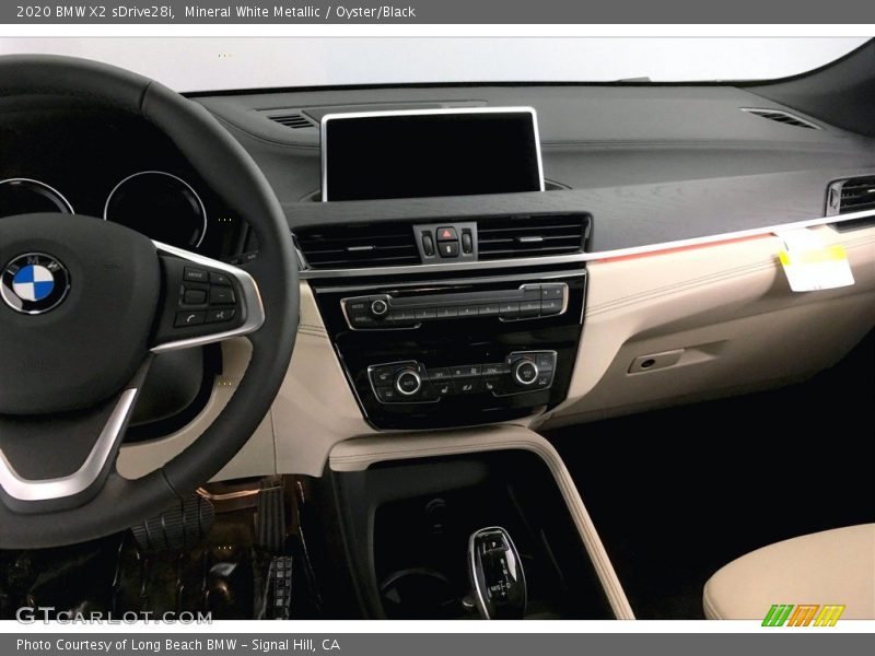 Mineral White Metallic / Oyster/Black 2020 BMW X2 sDrive28i