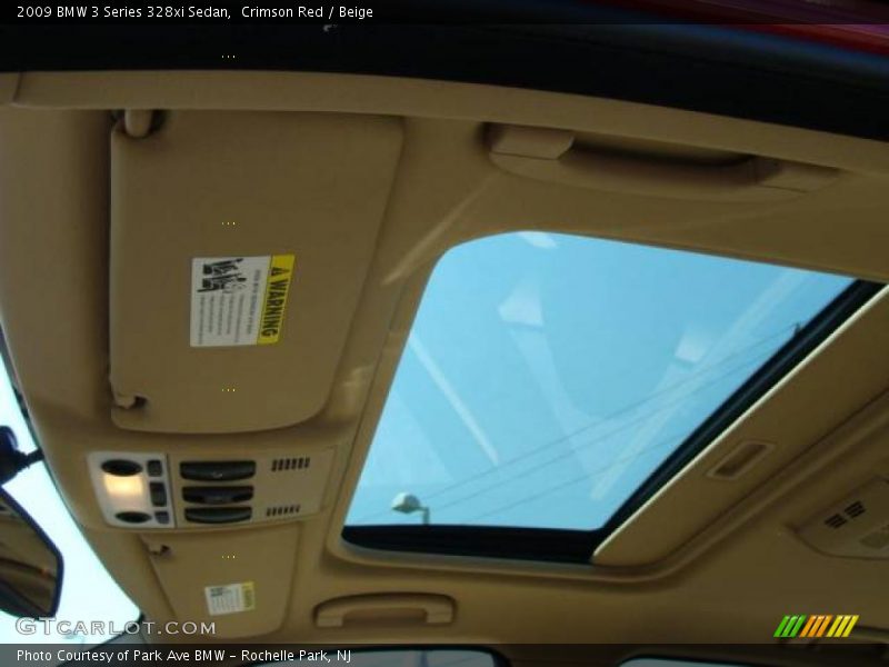 Crimson Red / Beige 2009 BMW 3 Series 328xi Sedan