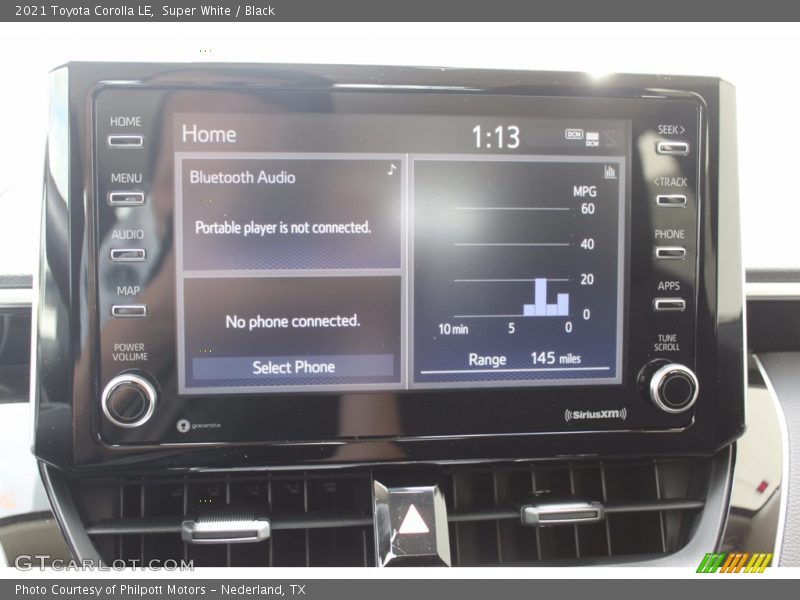 Super White / Black 2021 Toyota Corolla LE
