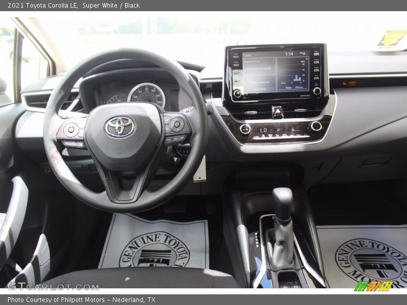 Super White / Black 2021 Toyota Corolla LE