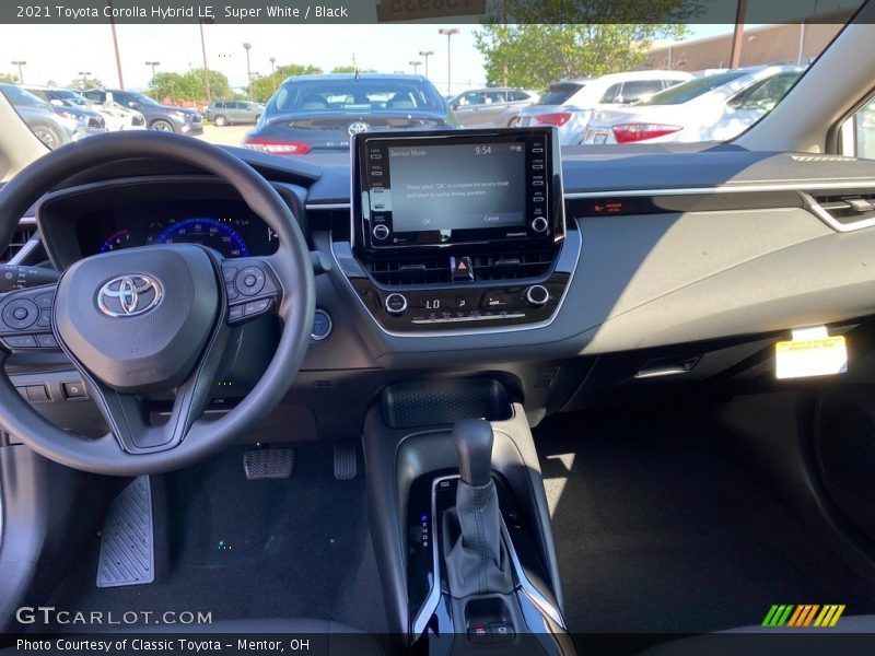 Super White / Black 2021 Toyota Corolla Hybrid LE