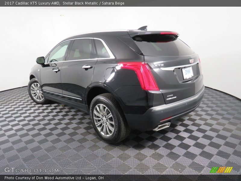 Stellar Black Metallic / Sahara Beige 2017 Cadillac XT5 Luxury AWD