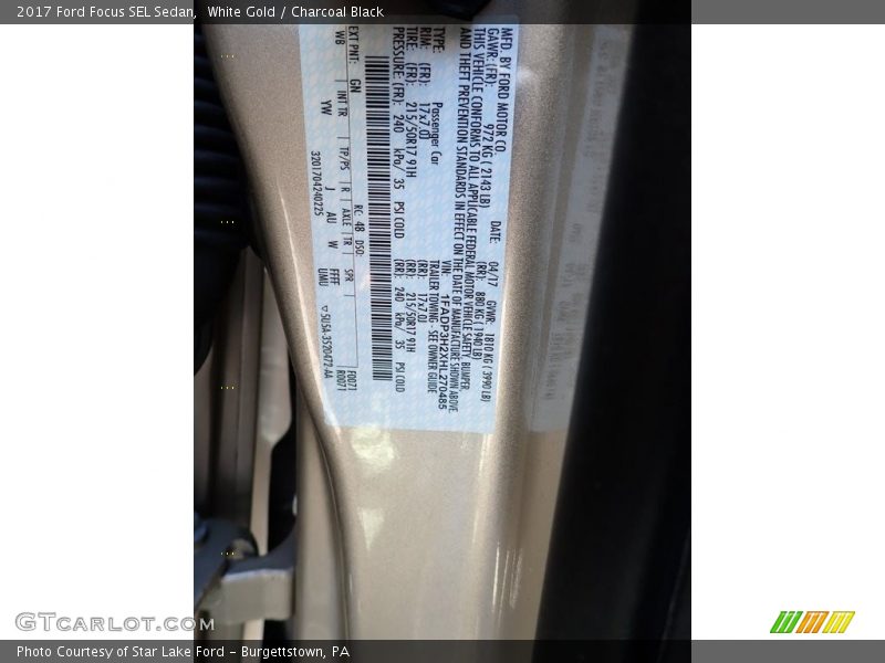 White Gold / Charcoal Black 2017 Ford Focus SEL Sedan