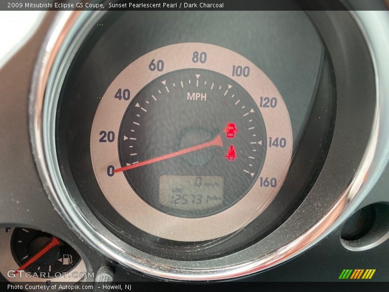 Sunset Pearlescent Pearl / Dark Charcoal 2009 Mitsubishi Eclipse GS Coupe