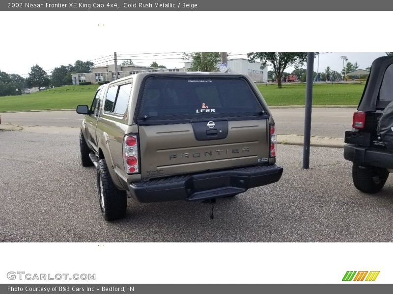Gold Rush Metallic / Beige 2002 Nissan Frontier XE King Cab 4x4