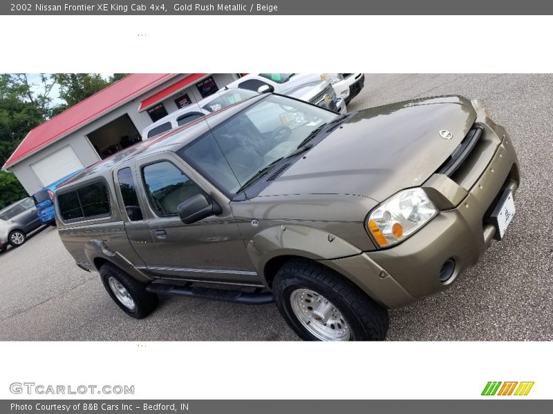 Gold Rush Metallic / Beige 2002 Nissan Frontier XE King Cab 4x4