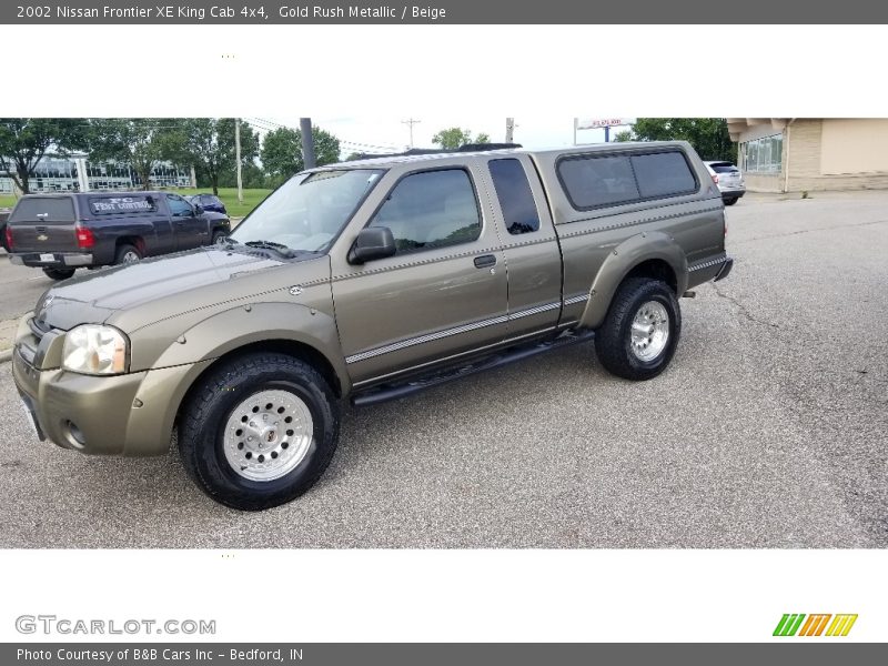  2002 Frontier XE King Cab 4x4 Gold Rush Metallic