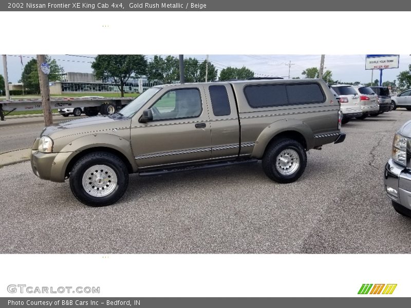  2002 Frontier XE King Cab 4x4 Gold Rush Metallic