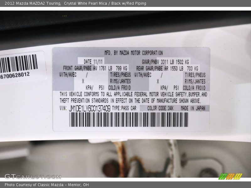 Crystal White Pearl Mica / Black w/Red Piping 2012 Mazda MAZDA2 Touring
