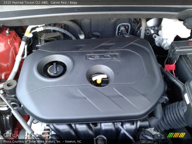 Garnet Red / Beige 2015 Hyundai Tucson GLS AWD