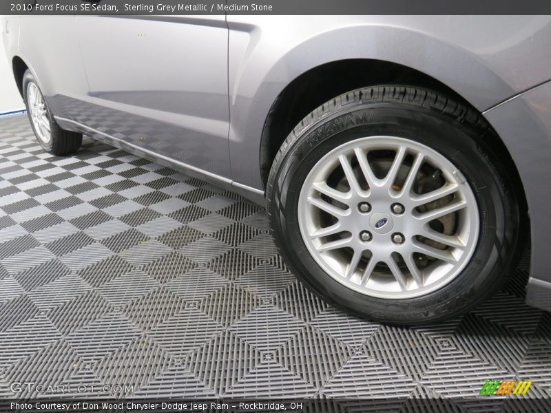 Sterling Grey Metallic / Medium Stone 2010 Ford Focus SE Sedan