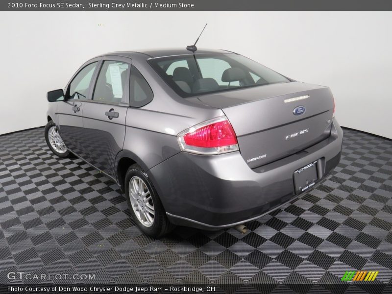 Sterling Grey Metallic / Medium Stone 2010 Ford Focus SE Sedan