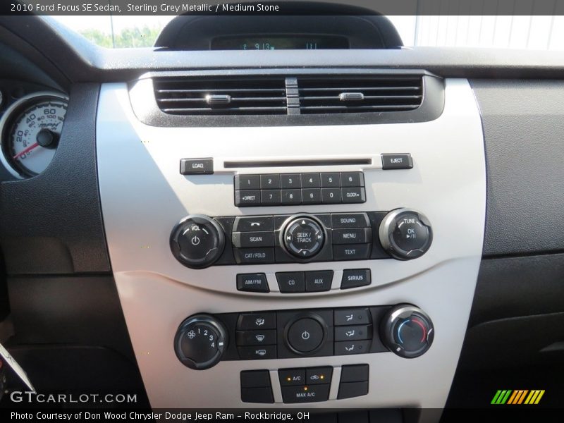 Sterling Grey Metallic / Medium Stone 2010 Ford Focus SE Sedan